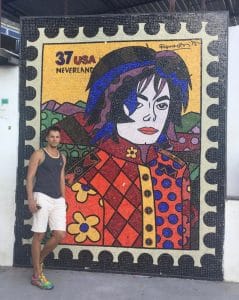 After around 20min we arrived at the most famous spot in Santa Marta: the slab of Michael Jackson. The set location couldn’t be more ideal for his political song “They don’t care about us.” His presence there was a huge turning point for the favela and the video clip called the world’s attention to one of the biggest problems in Brazil. The slab today is the most photographed spot in Santa Marta, and is a square that has events constantly (samba and feijoada every first Saturday of the month), along with a mosaic portrait of the King of Pop made by Romero Brito, and a bronze statue as well. From the slab the view is just spectacular!