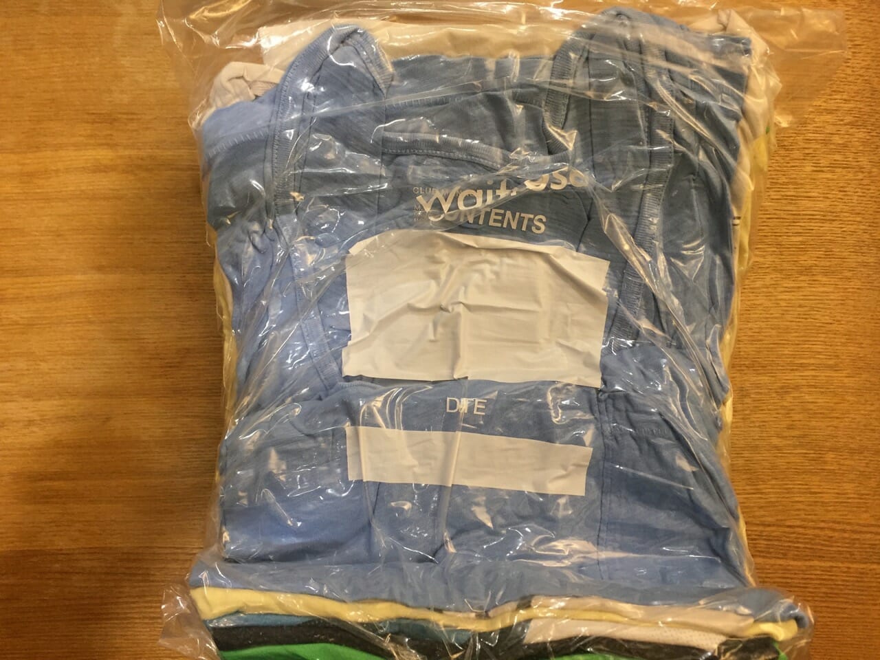 T-shirts inside a vacumm bag