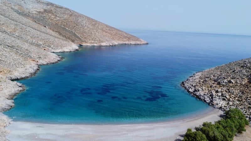 Aerial view over Kaminakia Beach, Astypalea. Greece