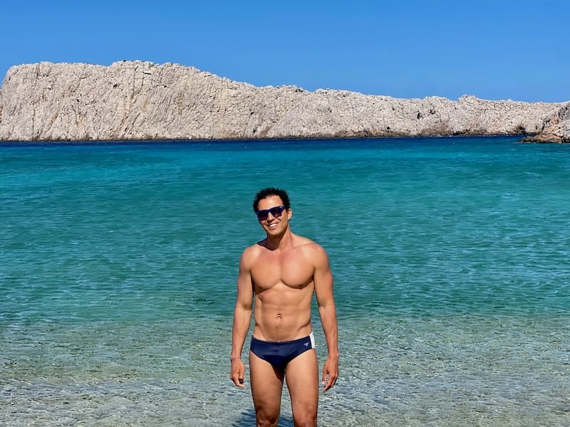 Pericles Rosa posing for a picture at Kounoupa Island in Astypalea, Greece